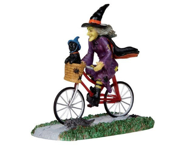 https://cdn.warentuin.nl/media/catalog/product/1/7/1770728162321091_lemax_spooky_town_kersthuisje_be_witching_bike_ride_lemax_3_ac5f.jpg