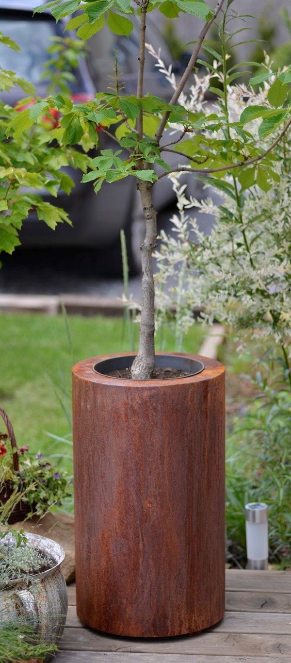 https://cdn.warentuin.nl/media/catalog/product/D/R/DROP5404033109818_01_geroba_plantenbakken_cortenstaal_ronda_ronde_plantenbakken_8946.JPG