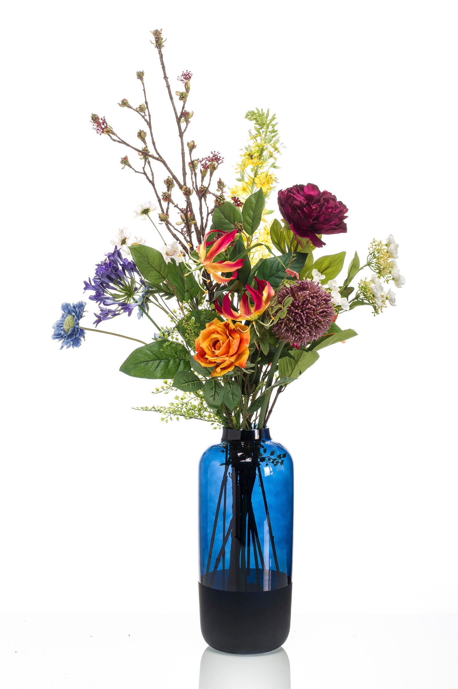 https://cdn.warentuin.nl/media/catalog/product/S/C/SCAN8714344301236_de_driesprong_bloemen_zijdebloem_boeket_mix_oranje_paars_aa67.jpeg
