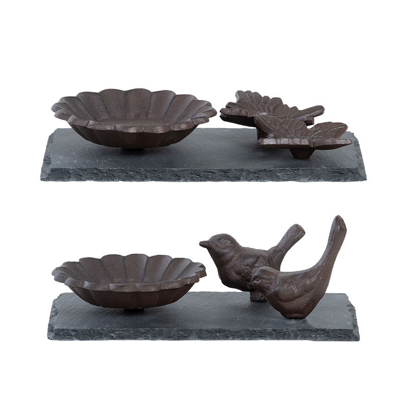 https://cdn.warentuin.nl/media/catalog/product/S/C/SCAN8714982193682_vogelbad_op_leisteen_vogel_vlinder_esschert_design_1829.jpg